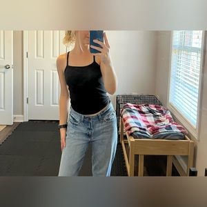 Black spaghetti strap tank top. Also comes in white